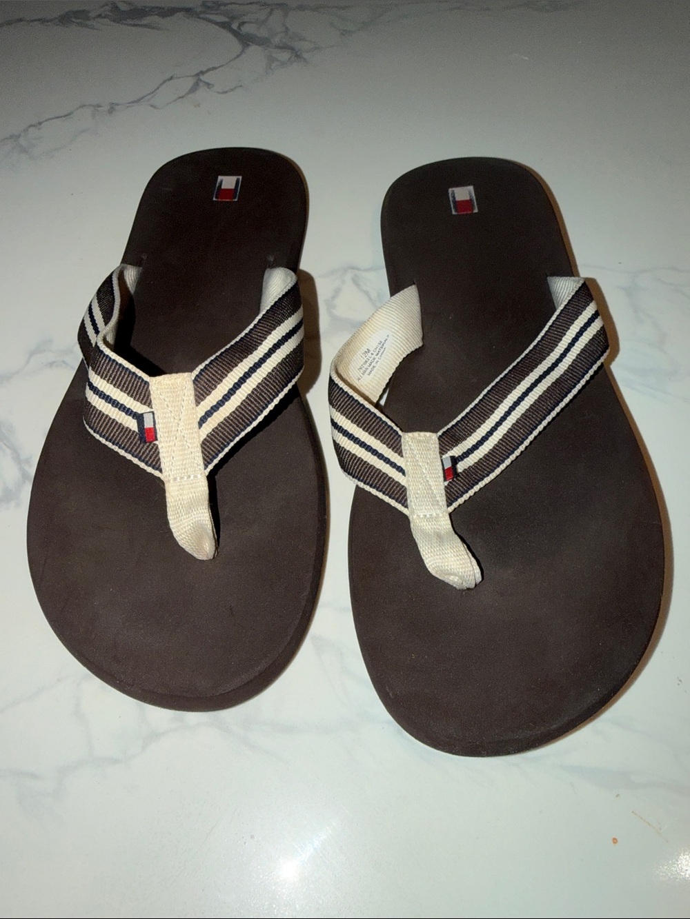 Tommy Hilfiger Comfort Beach Sandal Featuring Striped Polyester Thomg Straps